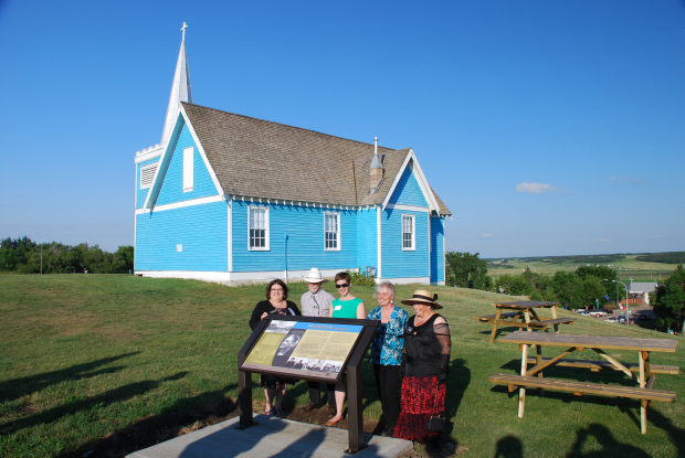 The unveiling of the St. Edmund’s heritage marker coincided with the Big Valley centennial and homecoming celebrations that took place August 1 – 3, 2014. L to R: Gail Knudson, Mayor of Big Valley; Asaph Johnson, Village Councillor; Brenda Manweiler, Historic Places Research and Designation; Lois Miller, Village Councillor and Director, Big Valley Historical Society; Trudy Spence, Secretary, Big Valley Historical Society 